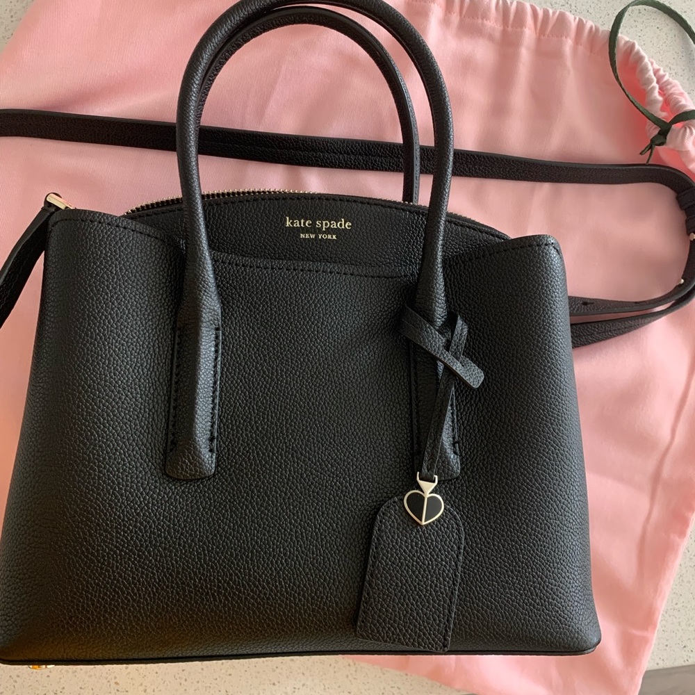 Kate Spade handbag almost new!!!! With a long strap could be made crossbody.